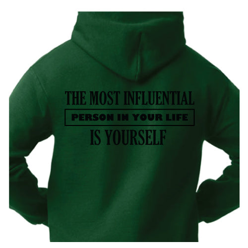Empowered Life Designs hoodie with bold black lettering reading "The Most Influential Person in Your Life Is Yourself" on a back of forest green hoodies.